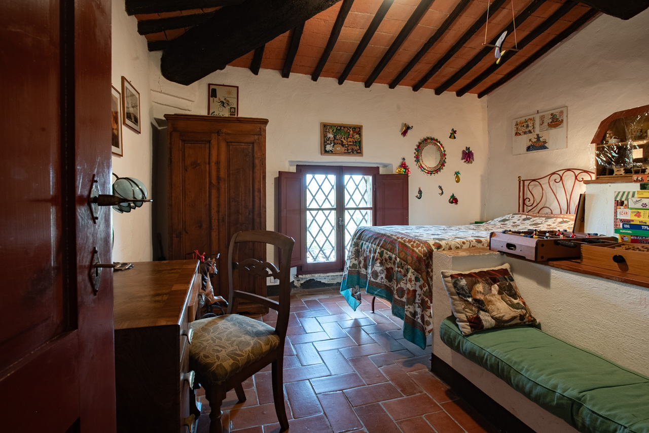 Bedroom with exposed wooden beam ceiling